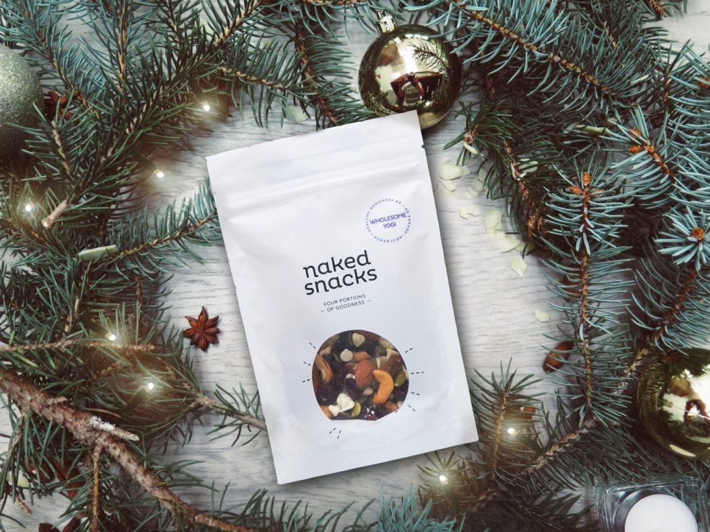 wholesome yogi snack bag from naked snacks surrounded by wreath and decorations