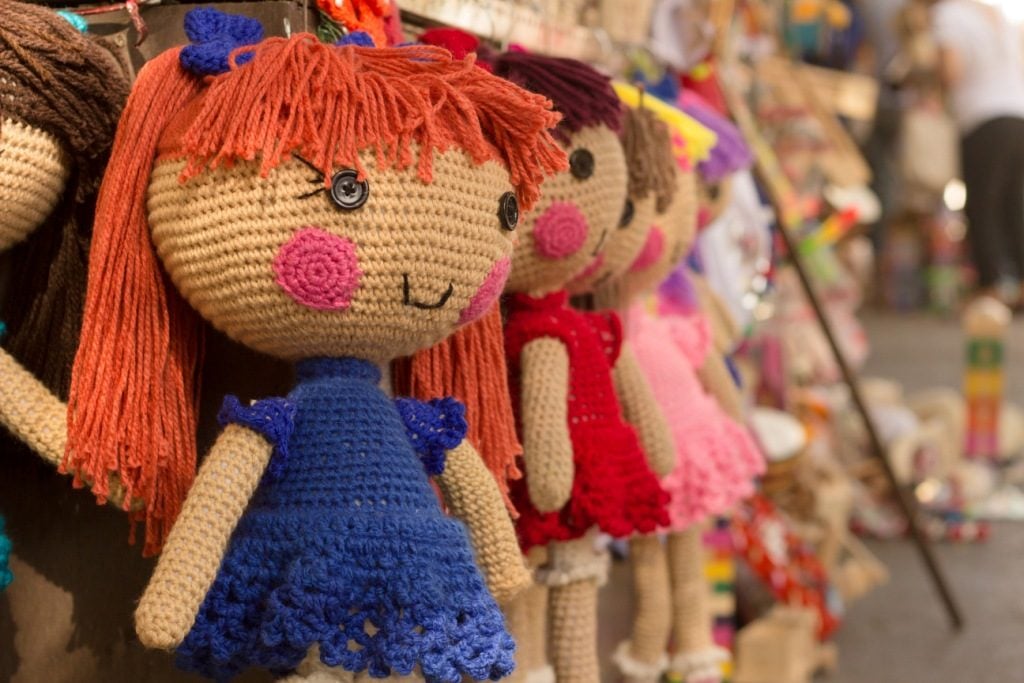 Row of knit dolls 