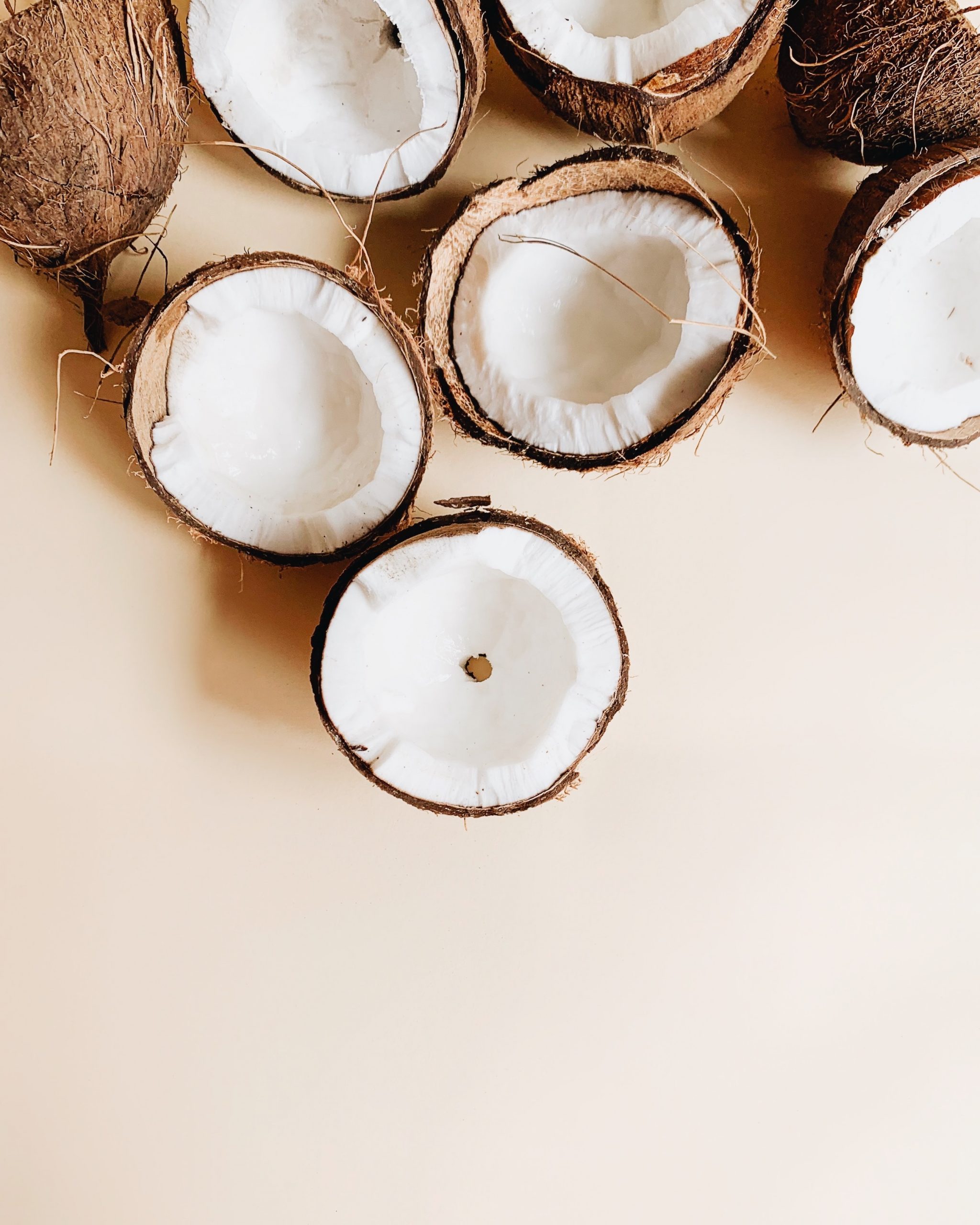 picture of coconuts, Photo by Irene Kredenets on Unsplash