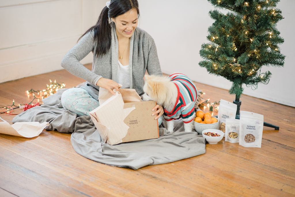 Naked Snack Gift Box Unwrapping with white dog