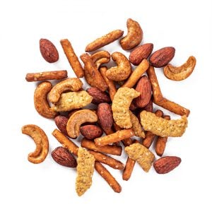 Hearty tamari snack mix made of dry roasted almonds, dry roasted cashews, pretzel sticks, oat bran sesame sticks